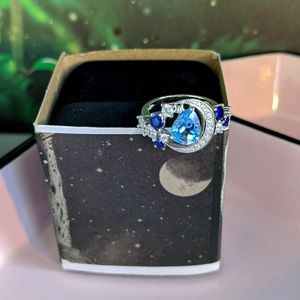 Blue Topaz and Sapphire Moon Goddess Ring Size 7